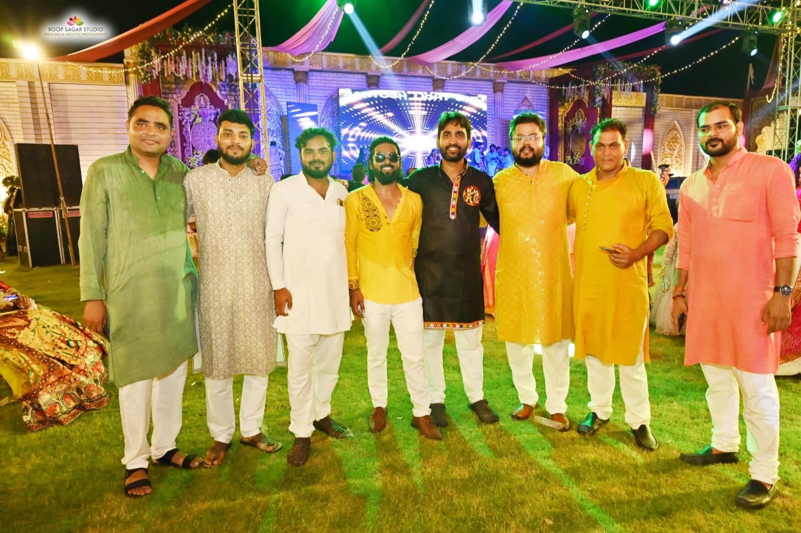 Guests in colourful kurtas gathered during a dandiya celebration at Adarsh Vatika